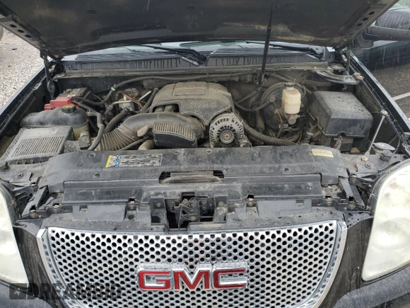 2011 GMC Yukon XL Denali z VIN 1GKS2MEF4BR140739, wystawiony jako Copart lot #50979175 z przebiegiem 237 005 mil mil oraz Szkody całkowita. Historia ofert i sprzedaży dostępna na DreamBid. Obrazek 13.