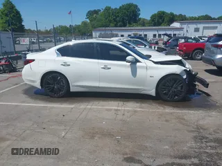 2019 Infiniti Q50 Luxe z VIN JN1EV7AP7KM513482, wystawiony jako IAAI lot #42000334 z przebiegiem 101 789 mil mil oraz . Historia ofert i sprzedaży dostępna na DreamBid. Obrazek 13.