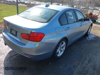 2013 BMW 3 Series 328i with VIN WBA3A5G5XDNP23336, listed as a IAAI auction lot 41895867 with 125,137 mi miles. Bid and sale history available at carsss.com. Image 4.