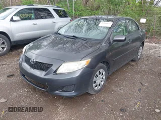 2009 Toyota Corolla with VIN JTDBL40E799040751, listed as a IAAI auction lot 42046821 with 199,634 mi miles. Bid and sale history available at carsss.com. Image 2.