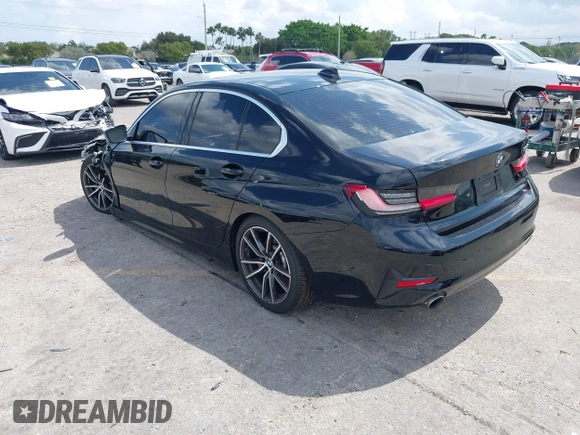 2021 BMW 3 Series 330i with VIN 3MW5R1J09M8B93600, listed as a IAAI auction lot 41735270 with 77,648 mi miles. Bid and sale history available at carsss.com. Image 3.