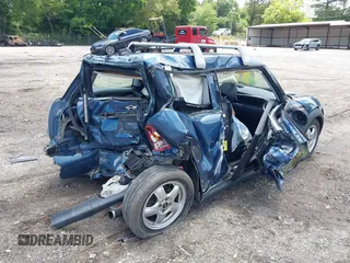 2009 MINI Hardtop with VIN WMWMF33509TU74290, listed as a IAAI auction lot 42538919 with 104,209 mi miles and . Bid and sale history available at DreamBid. Image 4.