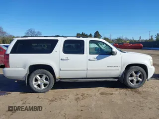 2008 Chevrolet Suburban Commercial with VIN 1GNFK163X8J134555, listed as a IAAI auction lot 41405739 with 205,810 mi miles. Bid and sale history available at carsss.com. Image 14.