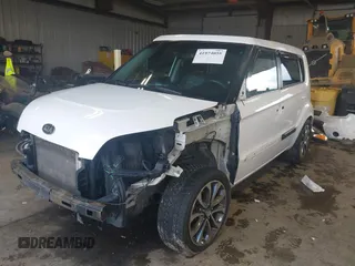 2011 Kia Soul + with VIN KNDJT2A24B7716580, listed as a IAAI auction lot 41974058 with 139,940 mi miles. Bid and sale history available at carsss.com. Image 2.