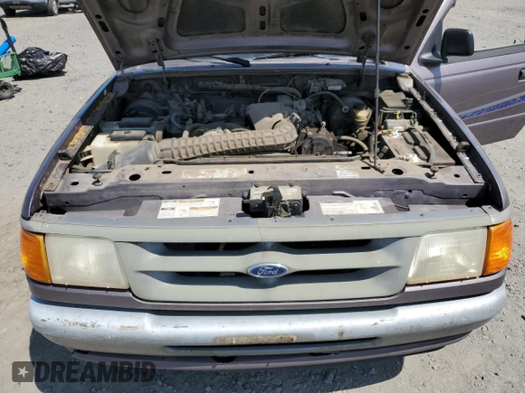 1995 Ford Ranger XLT z VIN 1FTCR10X0SPA73451, wystawiony jako Copart lot #60576195 z przebiegiem 140 064 mil mil oraz Czysty tytuł • Clean title. Historia ofert i sprzedaży dostępna na DreamBid. Obrazek 11.
