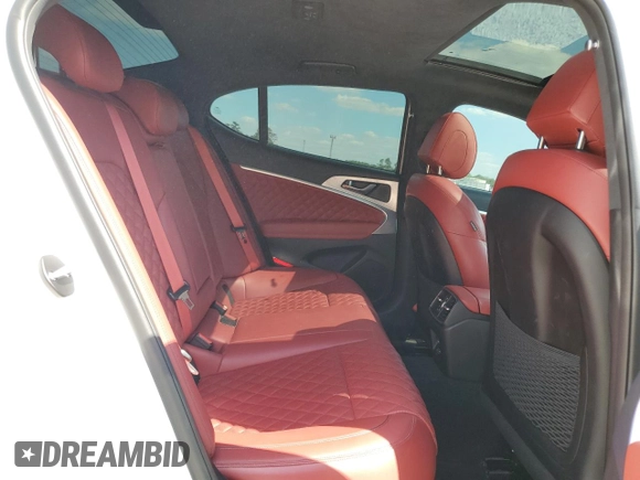 2023 Genesis G70 3.3T with VIN KMTG54TE7PU117917, listed as a Copart auction lot 73748604 with 33,688 mi miles and Clean Title. Bid and sale history available at DreamBid. Image 10.