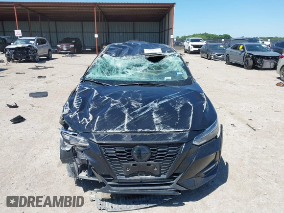 2022 Nissan Sentra SR z VIN 3N1AB8DV0NY313438, wystawiony jako IAAI lot #42076992 z przebiegiem Nie podano mil oraz . Historia ofert i sprzedaży dostępna na DreamBid. Obrazek 12.