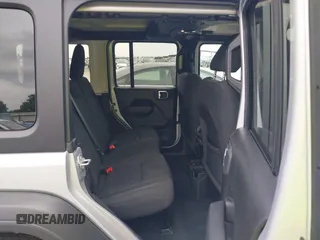 2023 Jeep Wrangler Sport with VIN 1C4HJXDG2PW508235, listed as a IAAI auction lot 42127823 with 25,069 mi miles and . Bid and sale history available at DreamBid. Image 8.