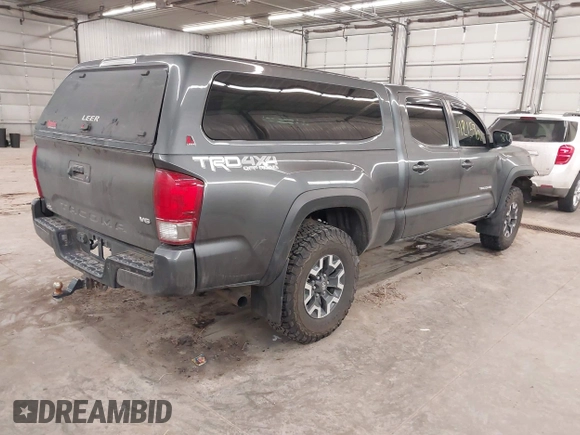 2016 Toyota Tacoma SR5 with VIN 3TMDZ5BN0GM012248, listed as a IAAI auction lot 41215908 with 170,756 mi miles and . Bid and sale history available at DreamBid. Image 4.