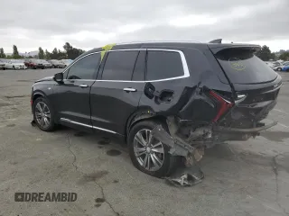 2022 Cadillac XT6 Premium Luxury with VIN 1GYKPDRS5NZ110989, listed as a Copart auction lot 69600894 with 56,148 mi miles and Salvage Title. Bid and sale history available at carsss.com. Image 2.
