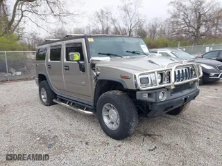 2004 Hummer H2 with VIN 5GRGN23U94H100078, listed as a IAAI auction lot 42028741 with 106,795 mi miles. Bid and sale history available at carsss.com. Image 1.