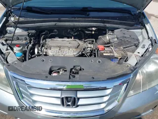 2010 Honda Odyssey EX with VIN 5FNRL3H44AB059711, listed as a IAAI auction lot 42057760 with 225,486 mi miles and . Bid and sale history available at DreamBid. Image 10.