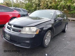 2014 Dodge Avenger SE with VIN 1C3CDZABXEN215101, listed as a IAAI auction lot 42021550 with 149,268 mi miles and . Bid and sale history available at DreamBid. Image 2.