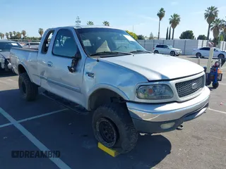 2000 Ford F-150 XL with VIN 1FTRX18L6YKA27310, listed as a IAAI auction lot 42375125 with Not provided miles and . Bid and sale history available at DreamBid. Image 1.