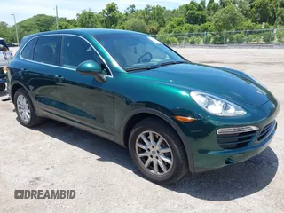 2014 Porsche Cayenne with VIN WP1AA2A21ELA06570, listed as a IAAI auction lot 42473298 with 61,421 mi miles and . Bid and sale history available at DreamBid. Image 1.