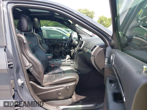 2017 Jeep Grand Cherokee Trailhawk with VIN 1C4RJFLG4HC843628, listed as a IAAI auction lot 42053878 with 83,551 mi miles and . Bid and sale history available at DreamBid. Image 5.