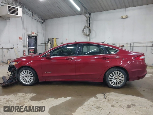 2013 Ford Fusion SE Hybrid with VIN 3FA6P0LU9DR150396, listed as a IAAI auction lot 42080329 with 195,665 mi miles. Bid and sale history available at carsss.com. Image 14.