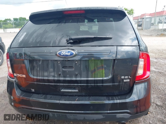 2014 Ford Edge SEL z VIN 2FMDK4JC3EBA01026, wystawiony jako IAAI lot #42229792 z przebiegiem 190 087 mil mil oraz . Historia ofert i sprzedaży dostępna na DreamBid. Obrazek 16.
