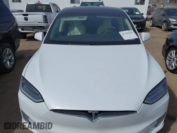 2018 Tesla Model X 75D with VIN 5YJXCBE27JF121834, listed as a IAAI auction lot 41769246 with 90,814 mi miles and . Bid and sale history available at carsss.com. Image 10.