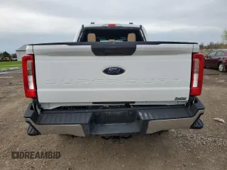 2023 Ford F-250 XL with VIN 1FT7W2BT9PED28983, listed as a Copart auction lot 51587385 with 29,364 mi miles and Salvage Title. Bid and sale history available at DreamBid. Image 6.