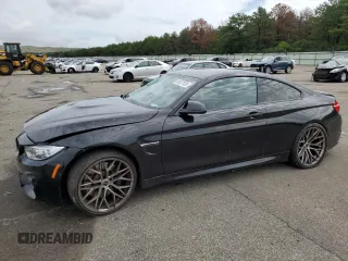 2015 BMW M4 with VIN WBS3R9C59FK330840, listed as a Copart auction lot 58437333 with 0 mi miles. Bid and sale history available at carsss.com. Image 1.