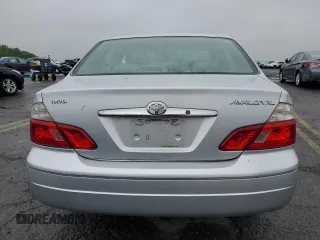 2004 Toyota Avalon XL z VIN 4T1BF28B94U380488, wystawiony jako Copart lot #57809445 z przebiegiem 103 078 mil mil oraz Szkoda całkowita • Salvage title. Historia ofert i sprzedaży dostępna na DreamBid. Obrazek 6.