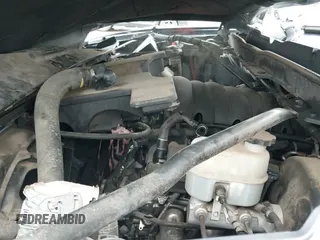 2015 Chevrolet Silverado 1500 LT z VIN 1GCVKREC8FZ190545, wystawiony jako IAAI lot #43085385 z przebiegiem 101 537 mil mil oraz . Historia ofert i sprzedaży dostępna na DreamBid. Obrazek 19.