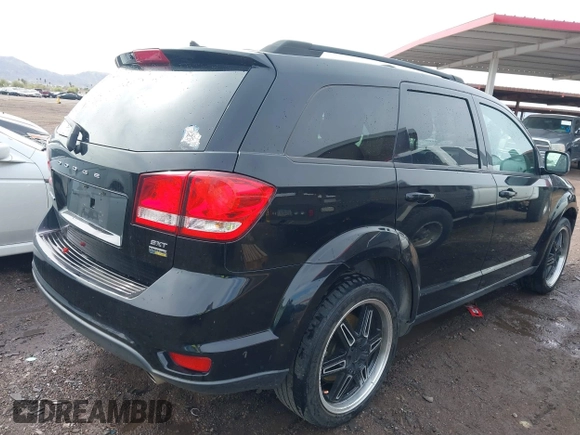2014 Dodge Journey SXT with VIN 3C4PDCBG1ET127798, listed as a IAAI auction lot 41799898 with 178,873 mi miles and . Bid and sale history available at DreamBid. Image 4.
