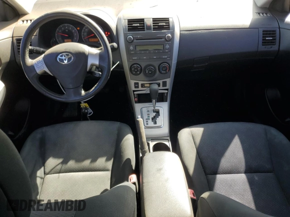 2010 Toyota Corolla with VIN 1NXBU4EE0AZ349836, listed as a Copart auction lot 48857815 with 157,773 mi miles and Salvage Title. Bid and sale history available at DreamBid. Image 8.