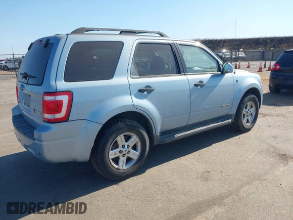 2008 Ford Escape Hybrid with VIN 1FMCU59H98KC31885, listed as a IAAI auction lot 42631198 with 369,266 mi miles and . Bid and sale history available at DreamBid. Image 4.