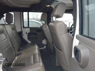 2010 Jeep Wrangler Unlimited Sahara with VIN 1J4HA5H19AL177179, listed as a IAAI auction lot 41565342 with 181,392 mi miles. Bid and sale history available at carsss.com. Image 8.