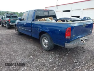 2002 Ford F-150 XL with VIN 1FTRX17W12NC06310, listed as a IAAI auction lot 42160213 with Not provided miles and . Bid and sale history available at DreamBid. Image 3.