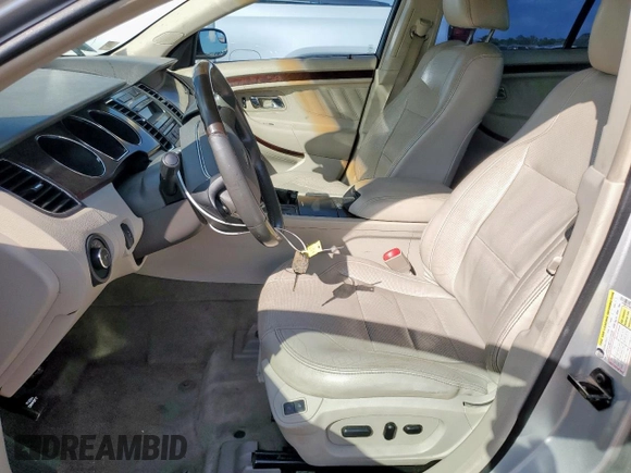 2012 Ford Taurus Limited with VIN 1FAHP2FW8CG109362, listed as a Copart auction lot 58862225 with 197,539 mi miles and Salvage title. Bid and sale history available at DreamBid. Image 7.