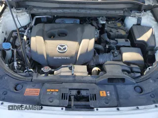 2021 Mazda CX-5 Grand Touring with VIN JM3KFBDM3M1305807, listed as a Copart auction lot 42713655 with 58,162 mi miles and Salvage Title. Bid and sale history available at DreamBid. Image 14.