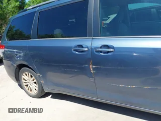2014 Toyota Sienna XLE with VIN 5TDYK3DC5ES481399, listed as a IAAI auction lot 42085550 with 154,157 mi miles. Bid and sale history available at carsss.com. Image 6.