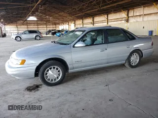 1995 Ford Taurus GL z VIN 1FALP524XSG154141, wystawiony jako Copart lot #77271544 z przebiegiem 72 118 mil mil oraz Czysty tytuł • Clean title. Historia ofert i sprzedaży dostępna na DreamBid. Obrazek 1.