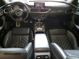 2014 Audi S6 Prestige z VIN WAUF2AFC2EN044116, wystawiony jako Copart lot #56415015 z przebiegiem 112 284 mil mil oraz Tytuł czysty. Historia ofert i sprzedaży dostępna na DreamBid. Obrazek 8.