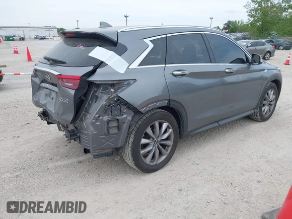 2019 Infiniti QX50 Luxe with VIN 3PCAJ5M19KF135211, listed as a IAAI auction lot 42308891 with 128,432 mi miles and . Bid and sale history available at DreamBid. Image 4.