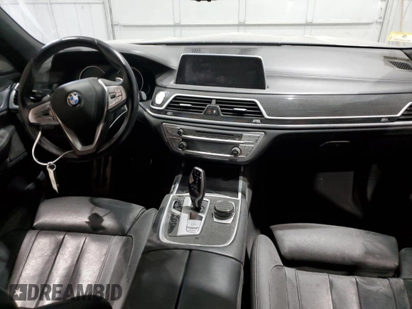 2019 BMW 7 Series 740i xDrive with VIN WBA7E4C58KGV70026, listed as a Copart auction lot 59465615 with Not provided miles and Salvage title. Bid and sale history available at DreamBid. Image 8.
