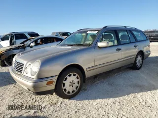 1998 Mercedes-Benz E-Class with VIN WDBJH65F9WA597132, listed as a Copart auction lot 77780094 with 0 mi miles and Salvage Title. Bid and sale history available at carsss.com. Image 1.