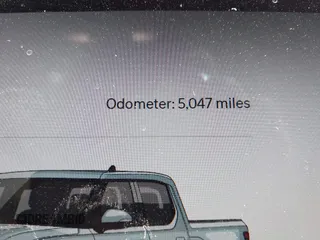 2023 Rivian R1T Adventure z VIN 7FCTGBAA9PN027894, wystawiony jako IAAI lot #42061339 z przebiegiem 5047 mil mil oraz . Historia ofert i sprzedaży dostępna na DreamBid. Obrazek 15.