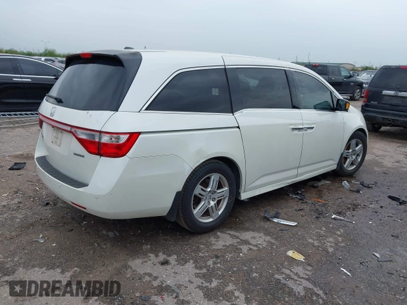 2013 Honda Odyssey Touring with VIN 5FNRL5H96DB074819, listed as a IAAI auction lot 41898358 with 123,428 mi miles and . Bid and sale history available at carsss.com. Image 4.