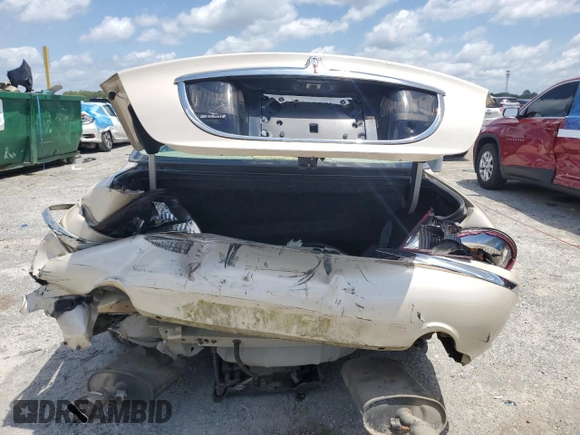 2001 Lincoln Continental z VIN 1LNHM97V91Y622267, wystawiony jako Copart lot #59915445 z przebiegiem 77 070 mil mil oraz Szkoda całkowita • Salvage title. Historia ofert i sprzedaży dostępna na DreamBid. Obrazek 6.