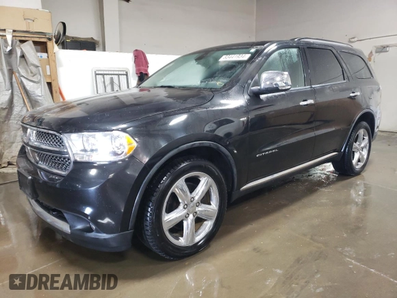 2012 Dodge Durango Citadel with VIN 1C4SDJET7CC183017, listed as a Copart auction lot 83441934 with 183,568 mi miles and Salvage Title. Bid and sale history available at DreamBid. Image 1.