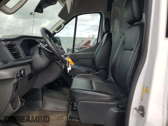 2023 Ford Transit Cargo z VIN 1FTYE1C89PKA17390, wystawiony jako Copart lot #83939214 z przebiegiem 76 099 mil mil oraz Szkoda całkowita • Salvage title. Historia ofert i sprzedaży dostępna na DreamBid. Obrazek 7.