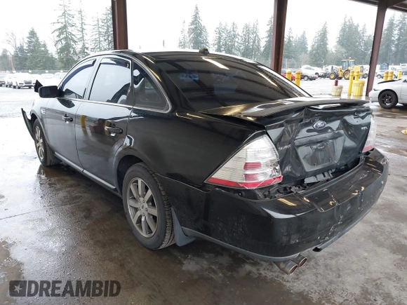 2008 Ford Taurus SEL z VIN 1FAHP24W98G169922, wystawiony jako IAAI lot #41861932 z przebiegiem 126 482 mil mil oraz . Historia ofert i sprzedaży dostępna na DreamBid. Obrazek 3.
