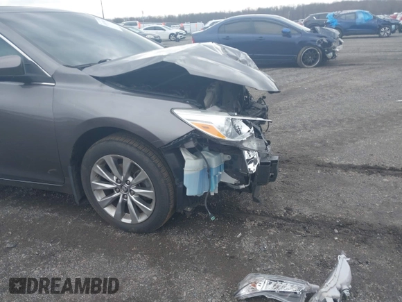 2015 Toyota Camry XLE with VIN 4T1BF1FKXFU936775, listed as a IAAI auction lot 41807486 with 97,148 mi miles and . Bid and sale history available at DreamBid. Image 6.
