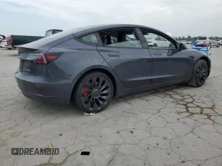 2021 Tesla Model 3 Performance z VIN 5YJ3E1EC5MF064890, wystawiony jako Copart lot #57186755 z przebiegiem 47 830 mil mil oraz Szkoda całkowita • Salvage title. Historia ofert i sprzedaży dostępna na DreamBid. Obrazek 3.