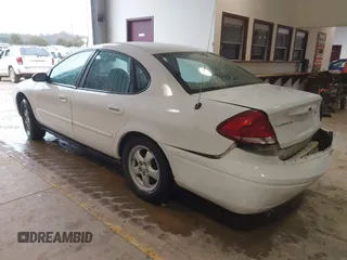 2004 Ford Taurus SE with VIN 1FAFP53UX4A151628, listed as a IAAI auction lot 41727306 with 218,321 mi miles and . Bid and sale history available at carsss.com. Image 3.