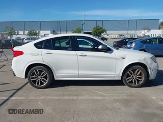 2017 BMW X4 M40i с VIN 5UXXW7C59H0U25191, выставлен на аукционе IAAI как лот 41867852 с пробегом 76 301 миль миль и . История ставок и продаж доступна на DreamBid. Изображение 13.